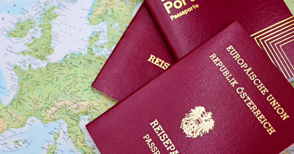 Passports from Portugal and Austria on a map
