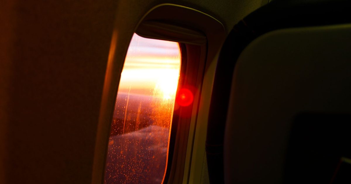 Sunset seen from an airplane window
