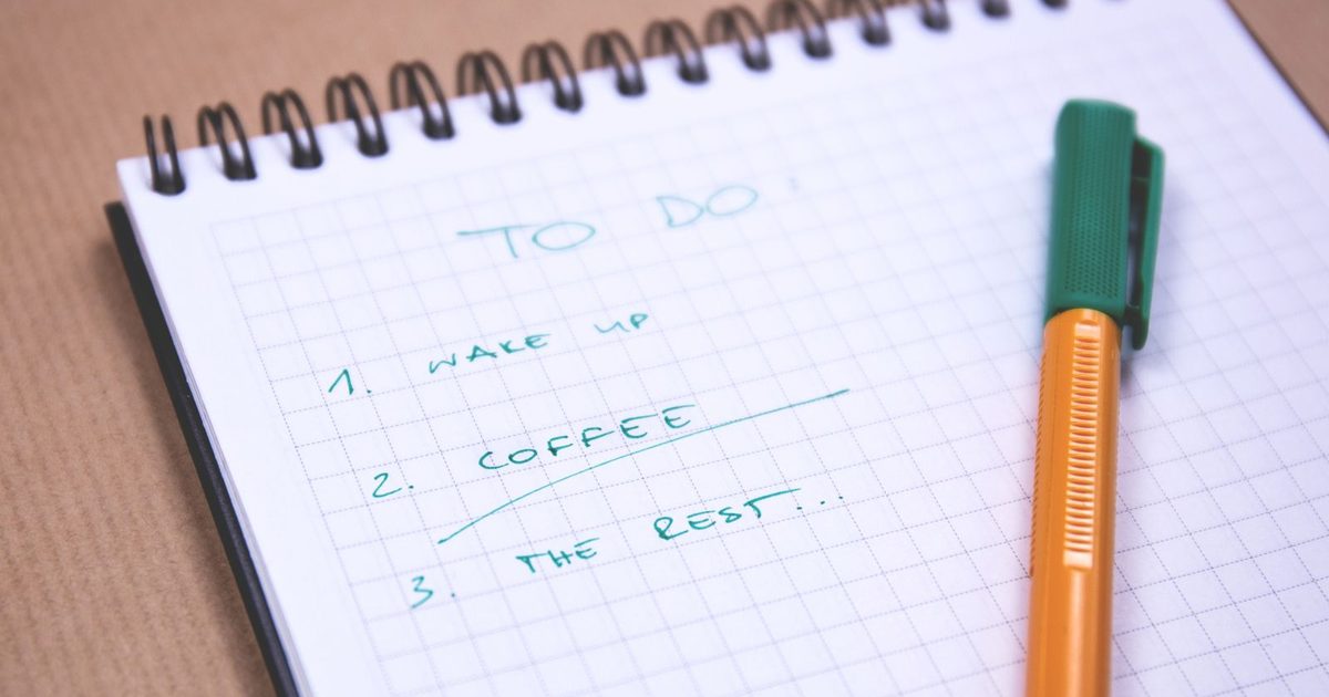 A handwritten to-do list in a notebook
