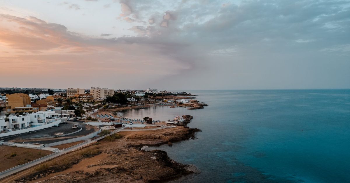 The Protaras coastline, Cyprus, under a sunset sky