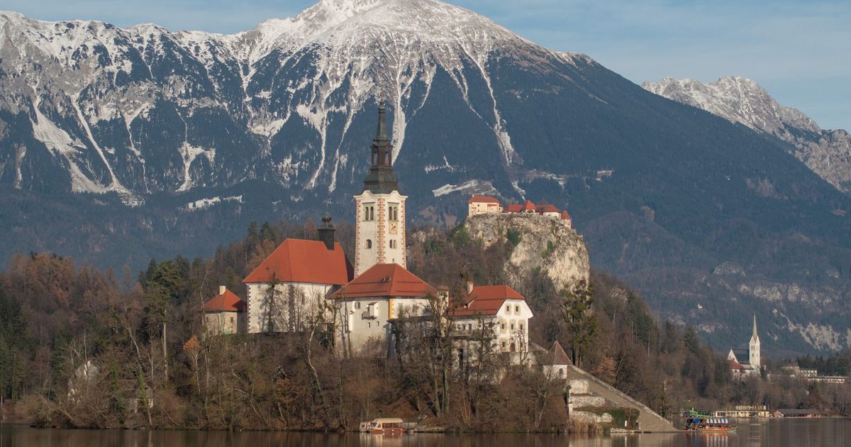 Bled Island and its church below the Julian Alps in winter